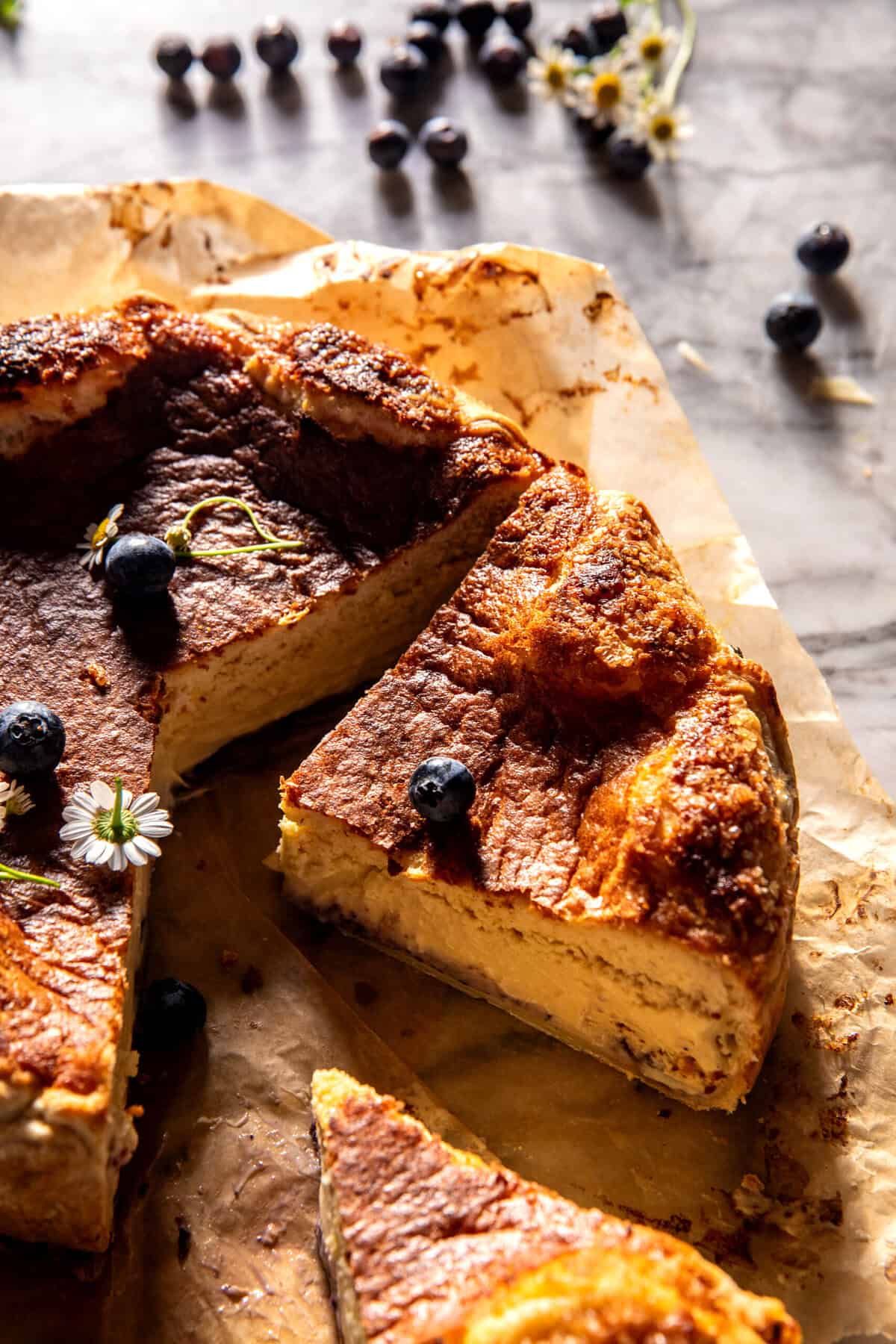 Custardy Burnt Basque Blueberry Cheesecake | halfbakedharvest.com